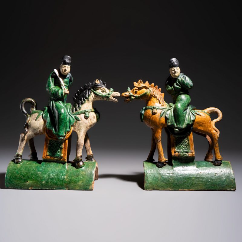 A pair of Chinese sancai-glazed stoneware 'Horseriders' roof tiles on later wooden stands - 图3