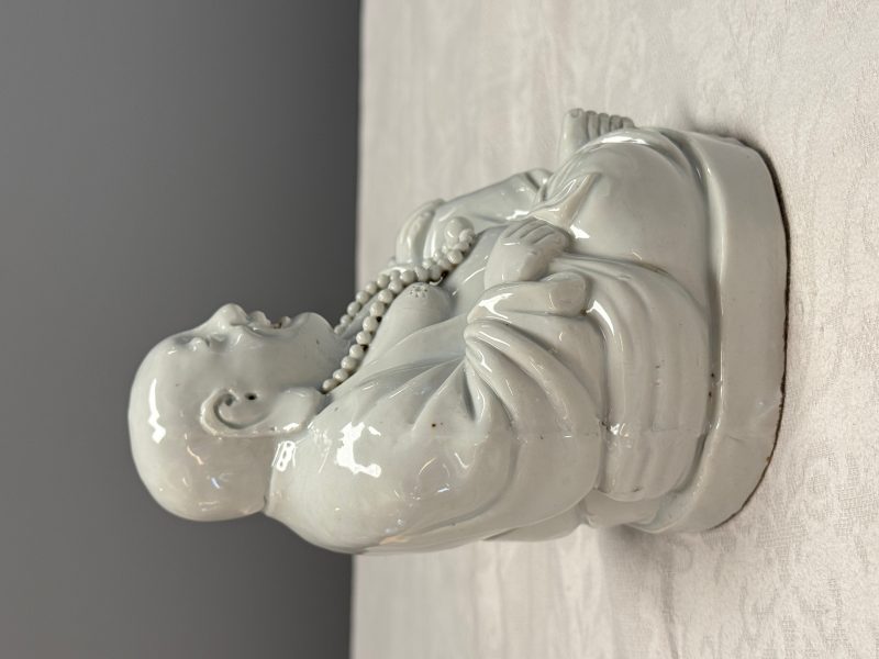 A Chinese white-glazed Milefo Buddha - 图11