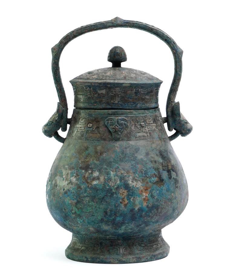 An archaic inscribed bronze wine vessel and cover, You - 图1