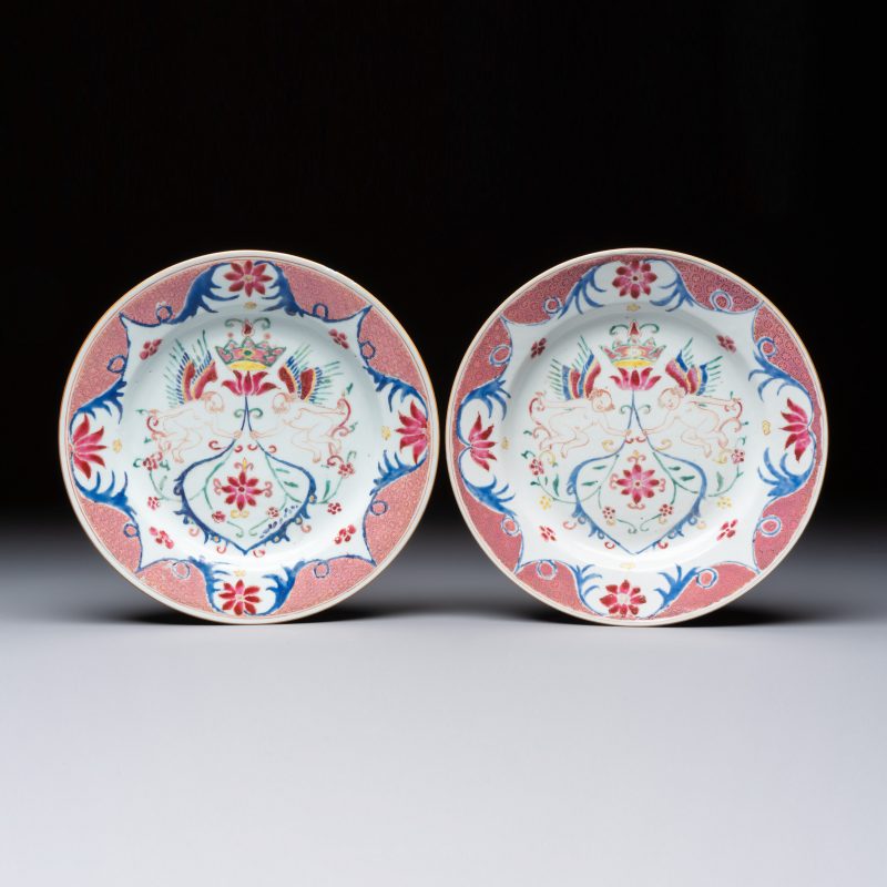 A pair of Chinese famille rose 'Winged Putti' plates