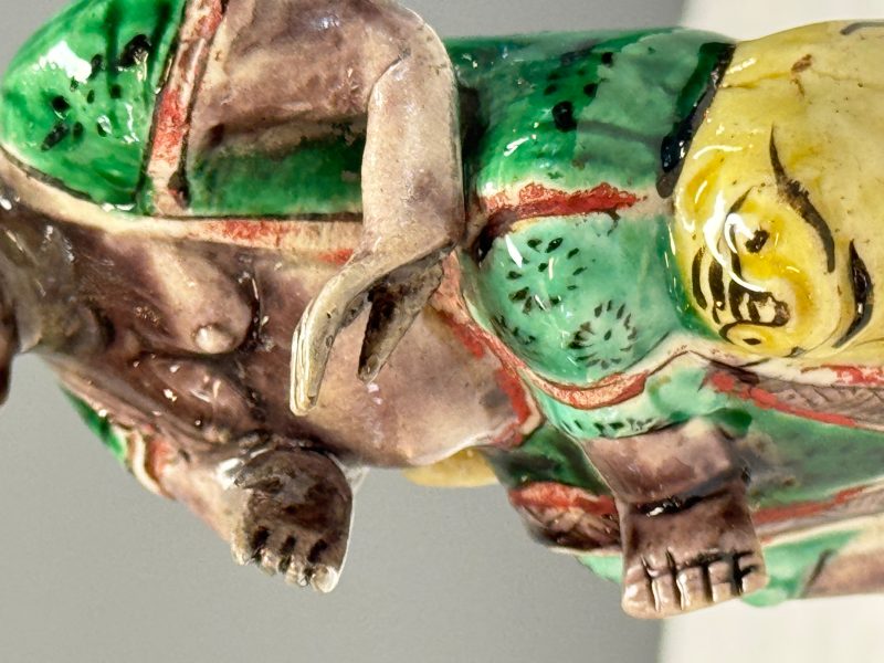 A Chinese famille verte sancai biscuit model of a seated Luohan on a tiger - 图13