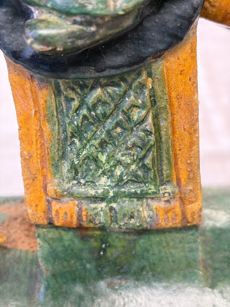 A pair of Chinese sancai-glazed stoneware 'Horseriders' roof tiles on later wooden stands - 图32