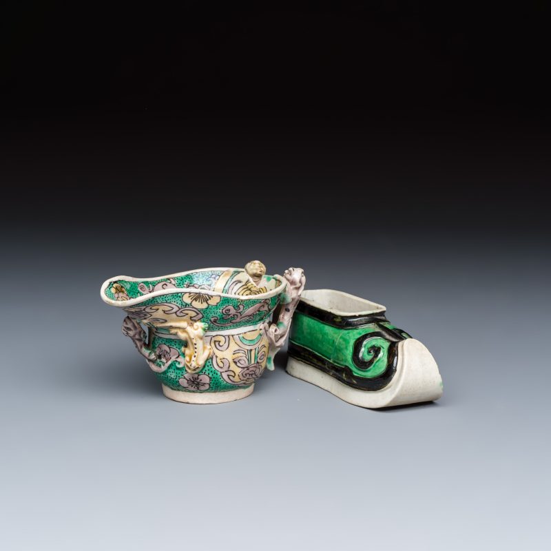 A Chinese famille verte sancai biscuit libation cup and a model of a shoe - 图1