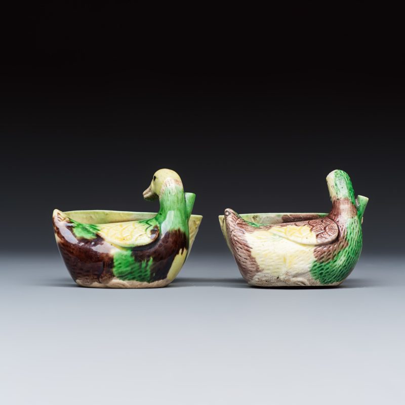 A pair of Chinese famille verte sancai biscuit duck-and-lotus-form water droppers on later wooden stands - 图4