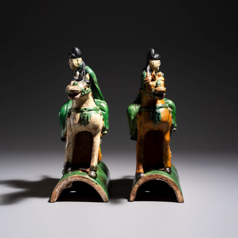 A pair of Chinese sancai-glazed stoneware 'Horseriders' roof tiles on later wooden stands - 图4