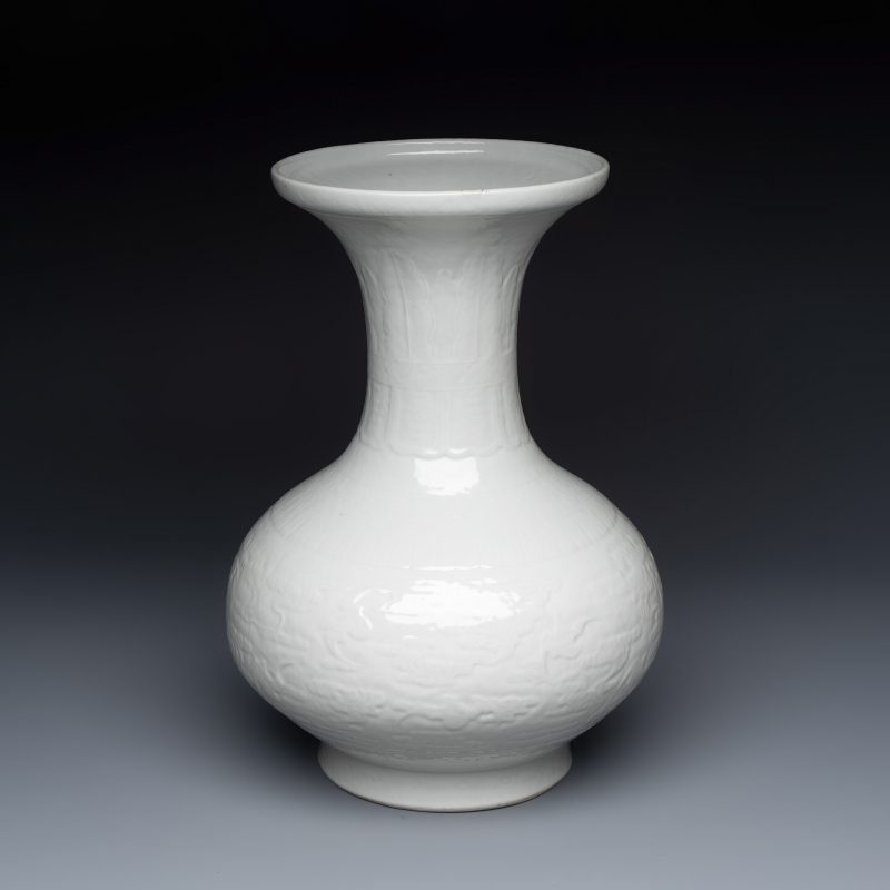 A Chinese white-glazed 'Bats among Clouds' vase with relief design - 图1