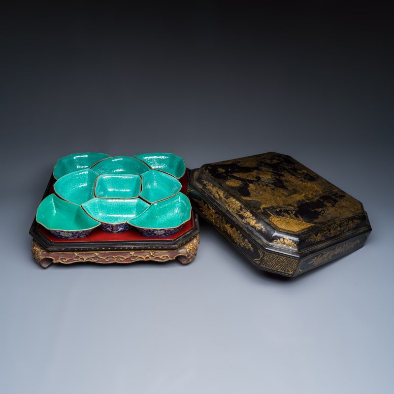 A Chinese polychrome-enamelled nine-piece sweetmeat set in a gilt-lacquered box