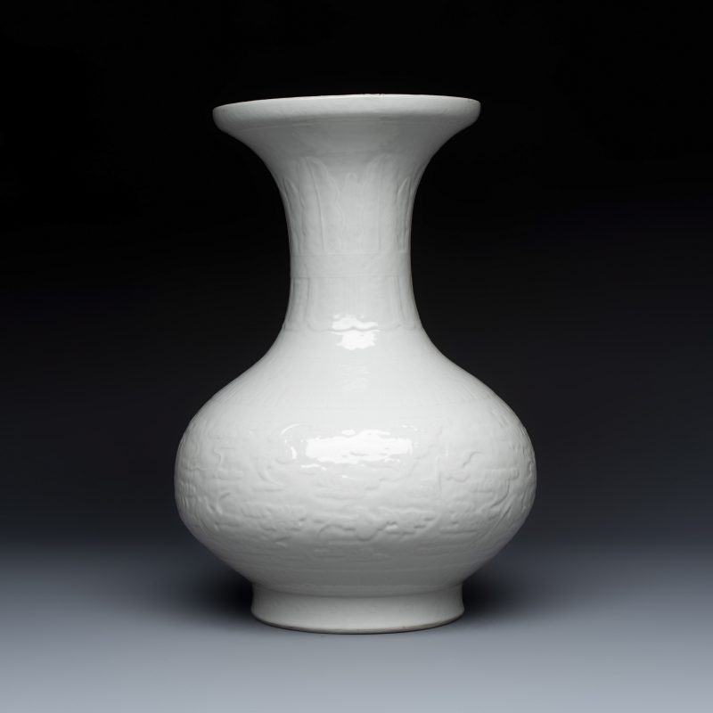 A Chinese white-glazed 'Bats among Clouds' vase with relief design - 图2