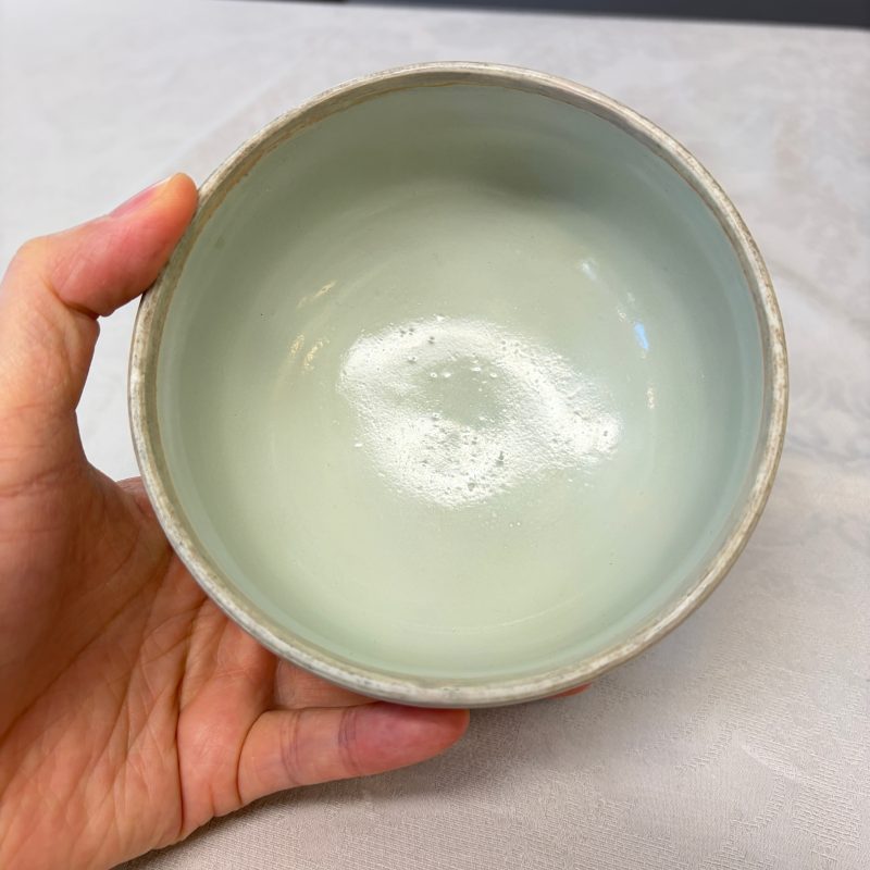 A Chinese celadon-glazed covered vase with floral relief design - 图21