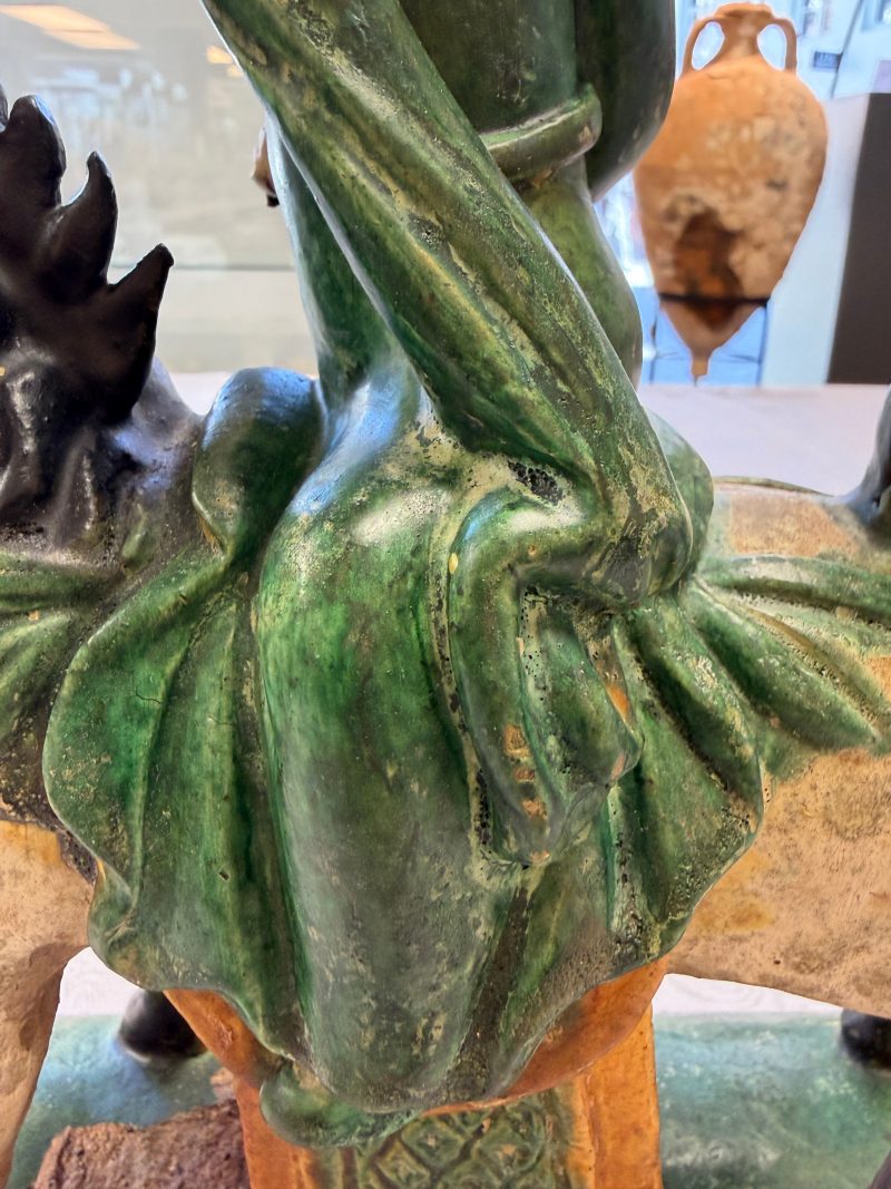 A pair of Chinese sancai-glazed stoneware 'Horseriders' roof tiles on later wooden stands - 图21
