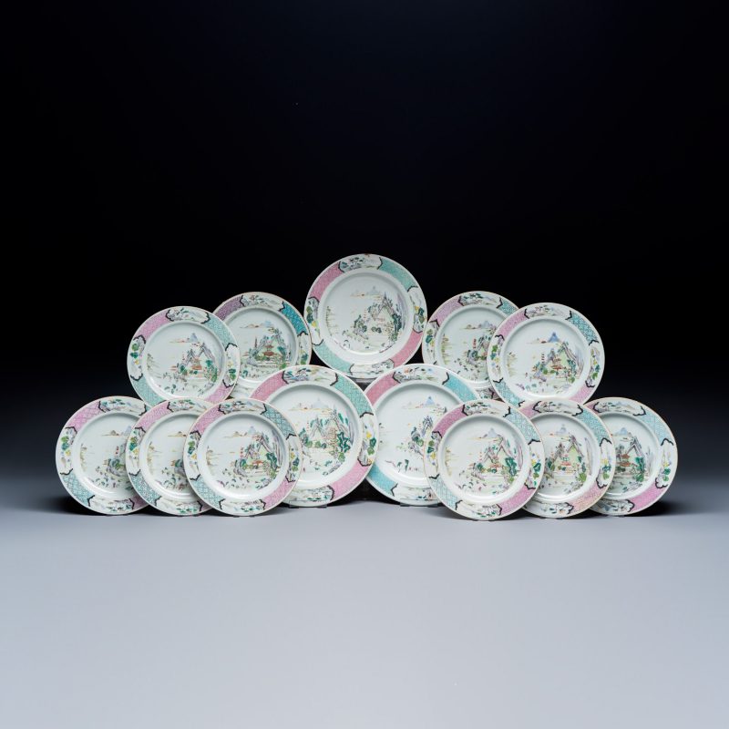 A collection of 13 Chinese famille rose 'Landscape' plates and dishes