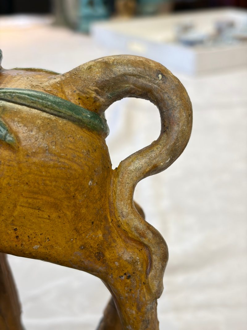 A pair of Chinese sancai-glazed stoneware 'Horseriders' roof tiles on later wooden stands - 图34