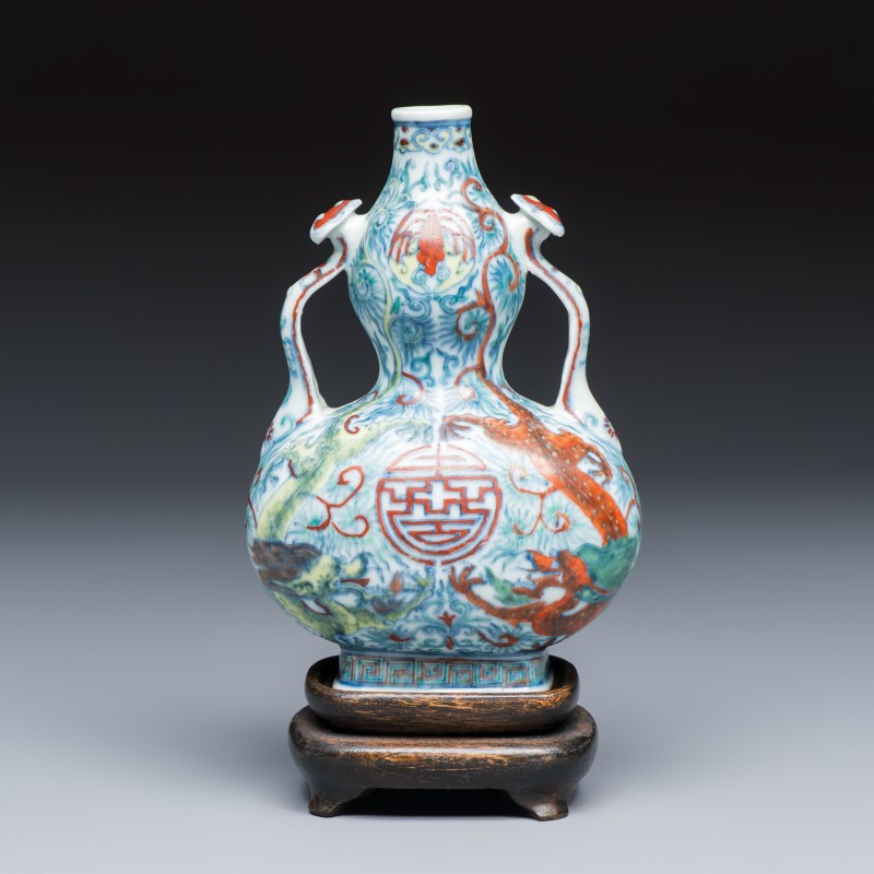 A Chinese doucai double-gourd vase with dragons and ruyi handles