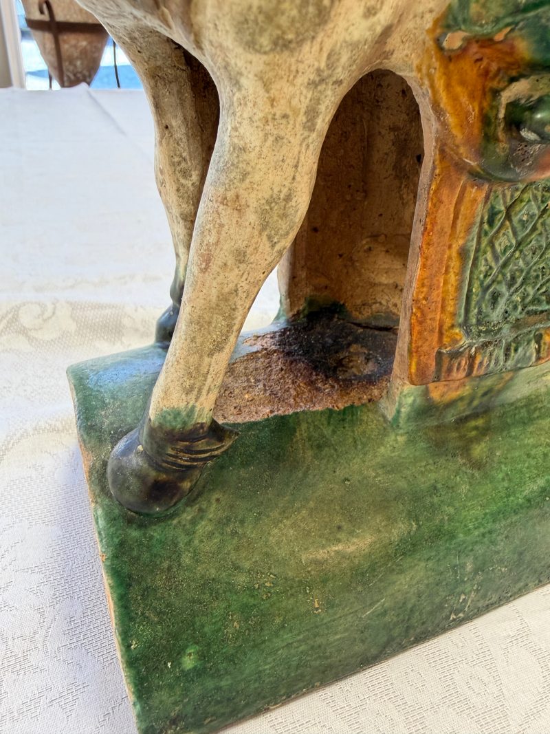A pair of Chinese sancai-glazed stoneware 'Horseriders' roof tiles on later wooden stands - 图22