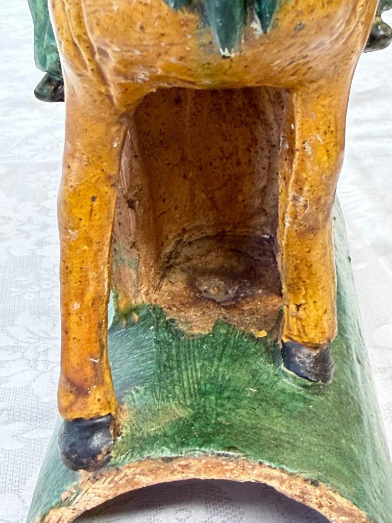 A pair of Chinese sancai-glazed stoneware 'Horseriders' roof tiles on later wooden stands - 图35