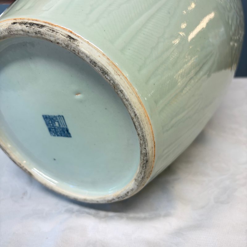 A Chinese celadon-glazed covered vase with floral relief design - 图19