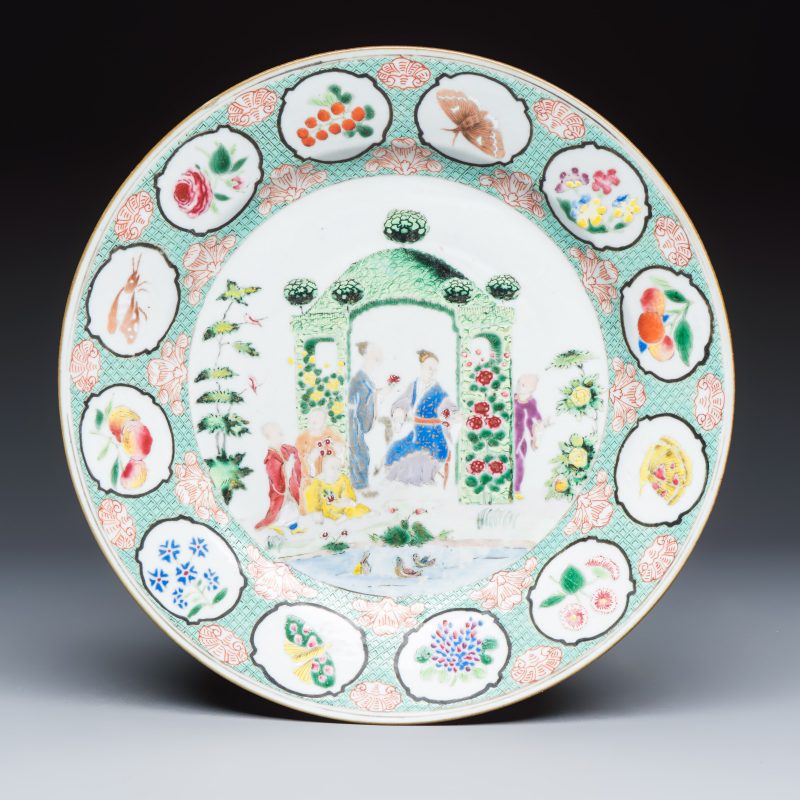 A Chinese famille rose 'arbour' plate after a design by Cornelis Pronk