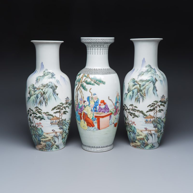 A pair of Chinese famille rose 'Landscape' vases and an 'Immortals' vase