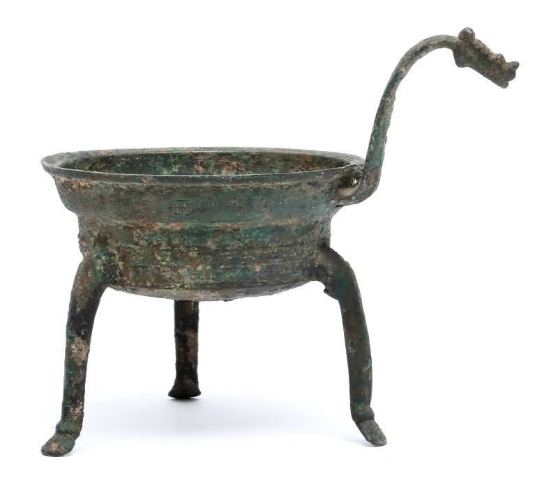 An inscribed bronze tripod heating vessel, Jiadou