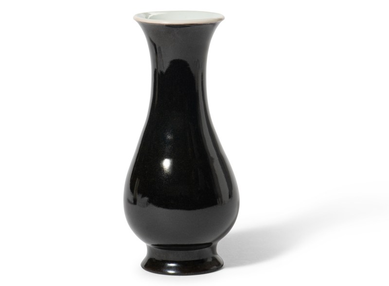 A mirror-black-glazed pear-shaped vase, Kangxi mark and of the period (1662-1722)