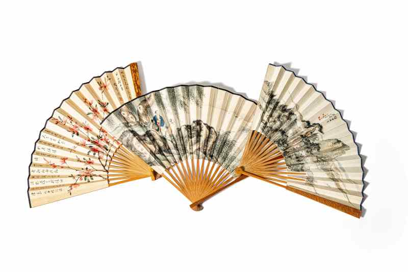 Three hand-painted paper fans