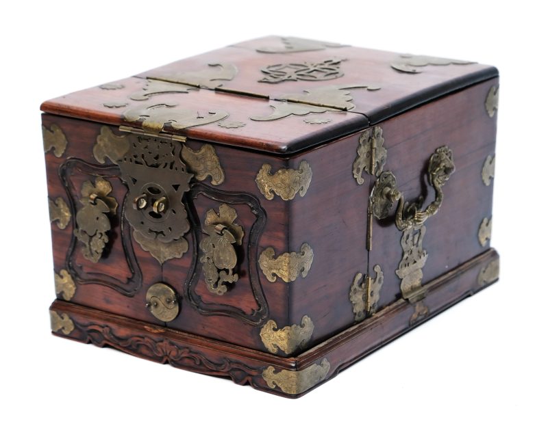 A hardwood brass-mounted jewellery box