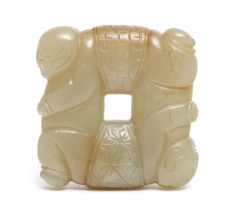 四喜童子 | A jade Si Xi Tongzi (四喜童子) four boys pendant or scroll weight