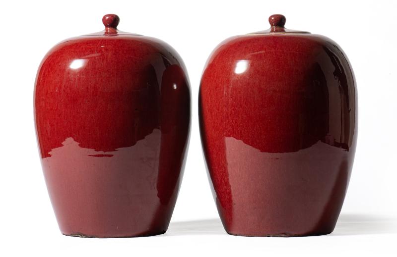 A pair of flambé-glazed jars and covers