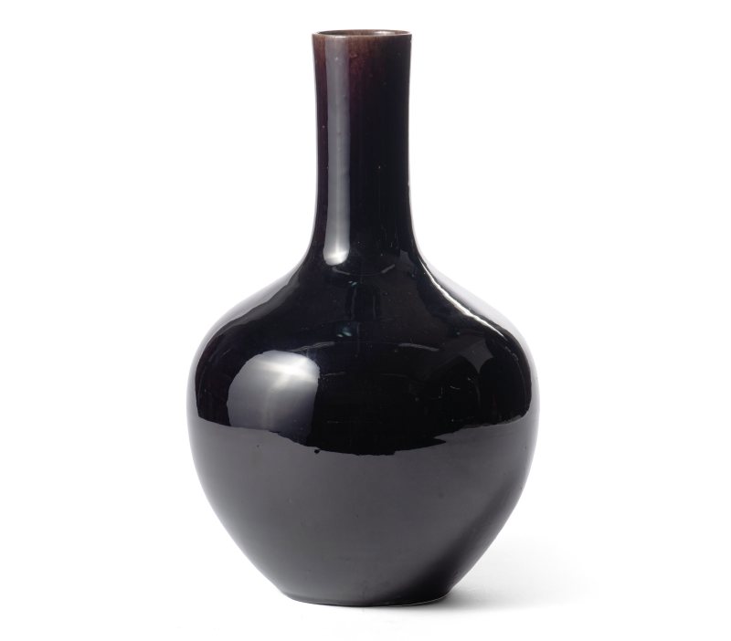 A large aubergine-glazed vase