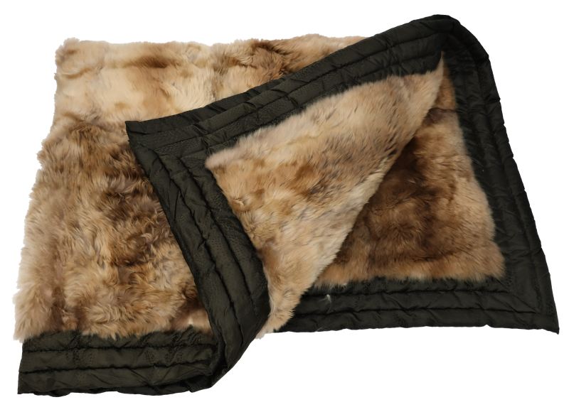 A fur blanket with silk-lined padding