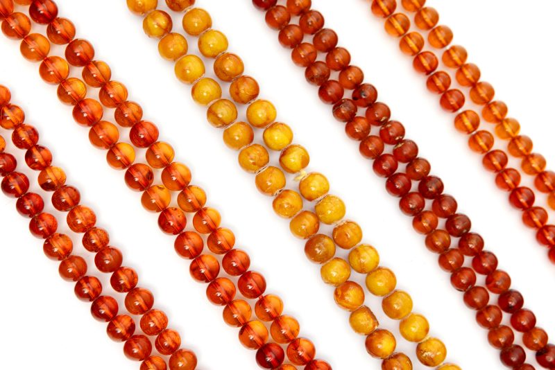 Five amber bead necklaces