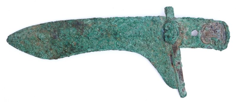 An archaic bronze dagger-axe, Ge