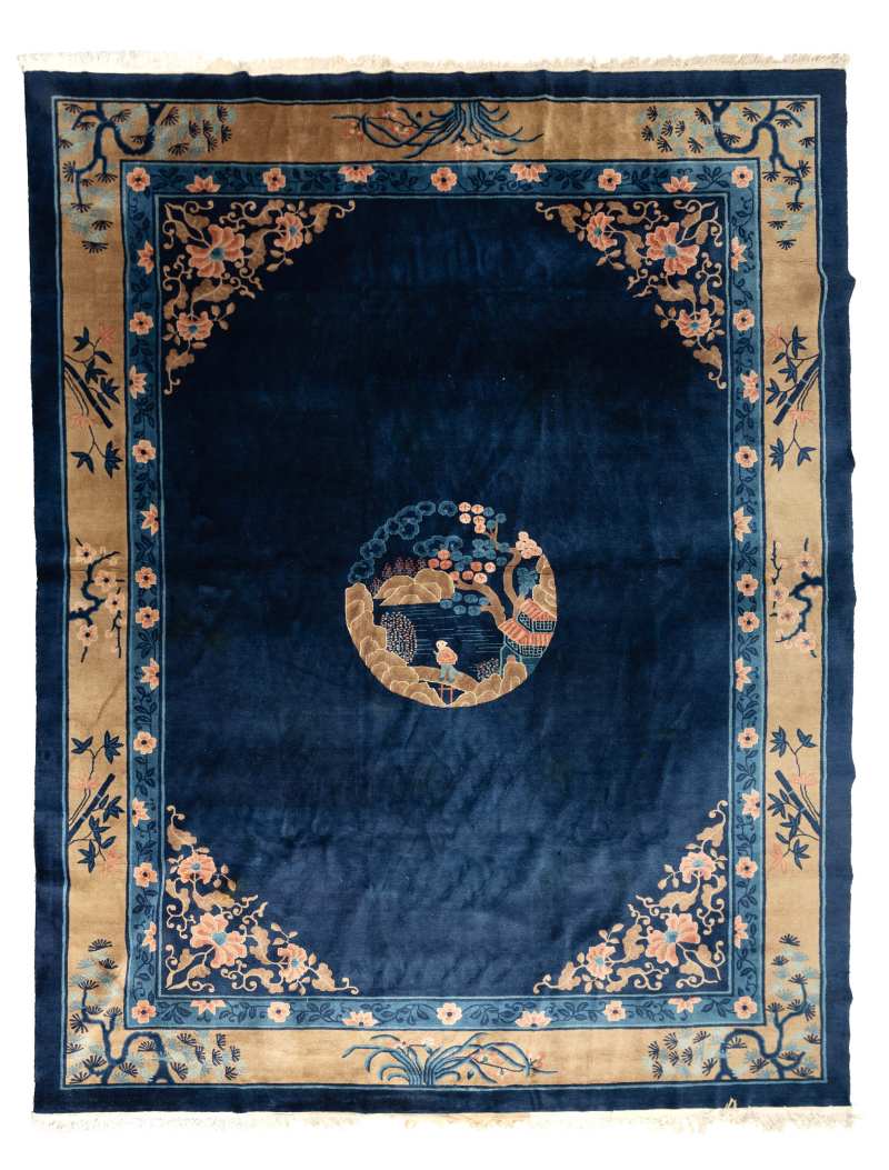 A woolen carpet with a floral pattern on a blue ground - 图1