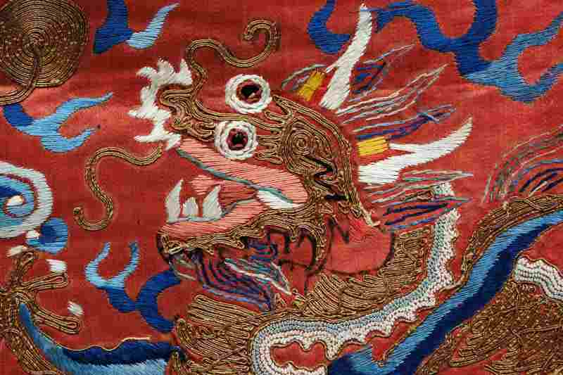 A silk red-ground embroidered dragon robe panel - 图5