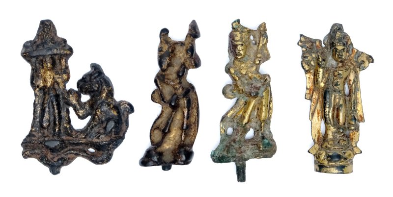 A group of four small gilt-bronze figures