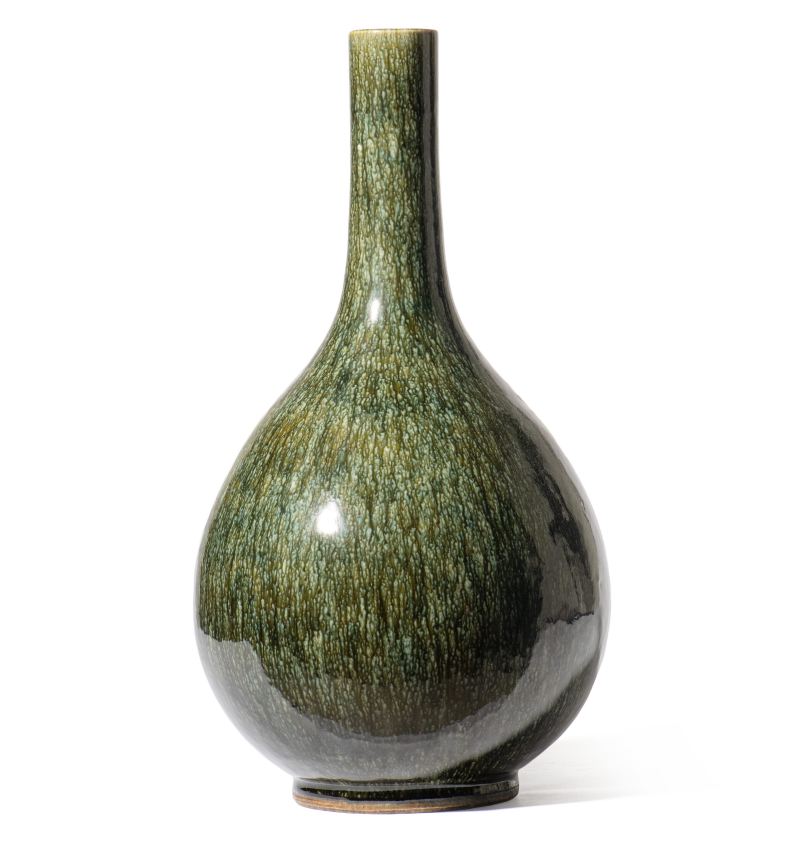 A large mottled-green-glazed bottle vase