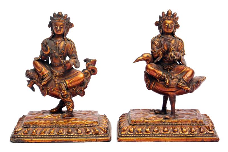 A pair of gilt-lacquered wooden deity figures