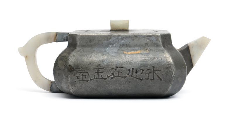 A pewter and jade inscribed teapot
