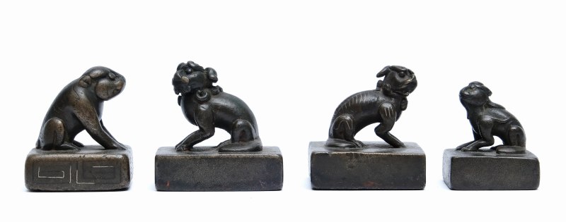 Four small bronze seals