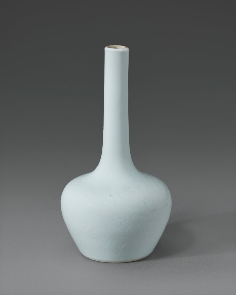 清雍正 白釉暗花螭龍紋小長頸瓶 雙圈六字楷書款  YONGZHENG SIX-CHARACTER MARK IN UNDERGLAZE BLUE WITHIN A DOUBLE CIRCLE AND OF THE PERIOD (1723-1735)