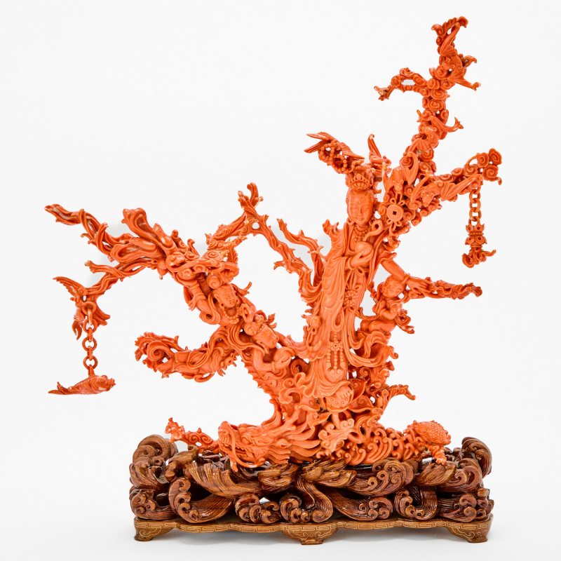 A Chinese Coral Carving of a Figural Group