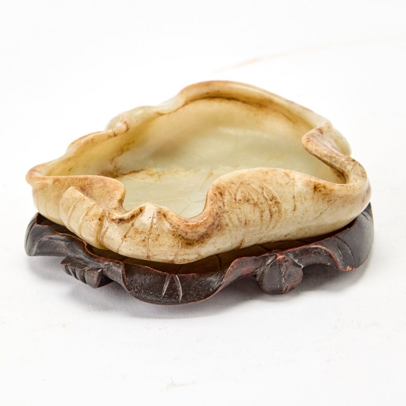 A Chinese Russet and Pale Celadon Jade Carving