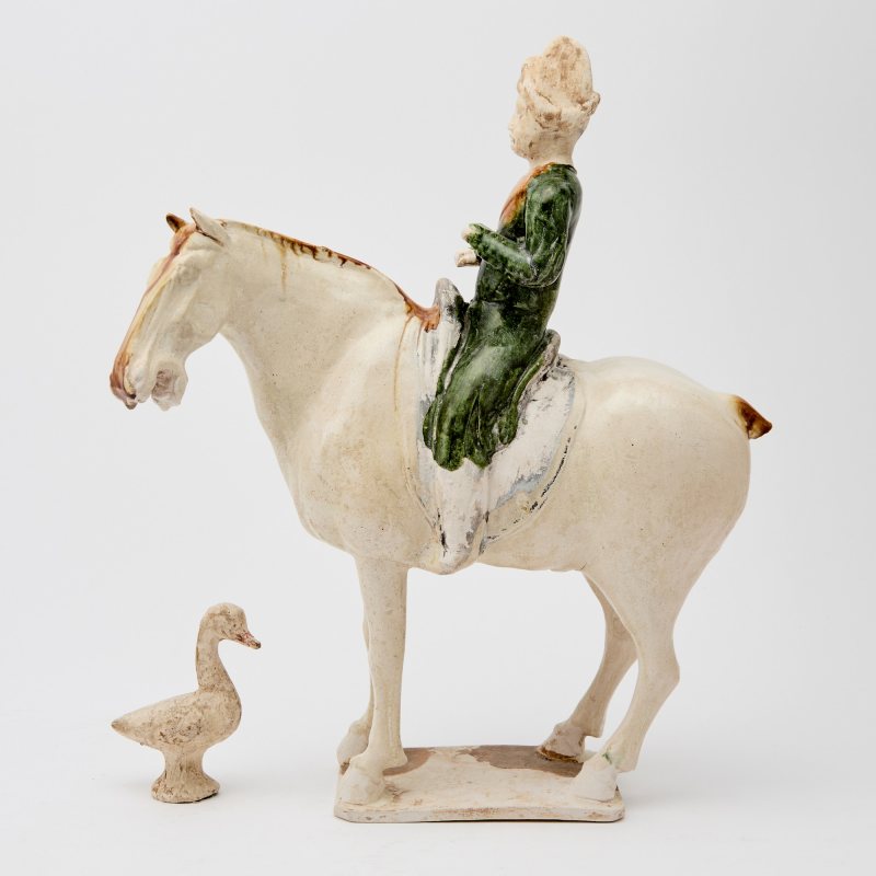 A Chinese Sancai Glazed Pottery Equestrian Figure