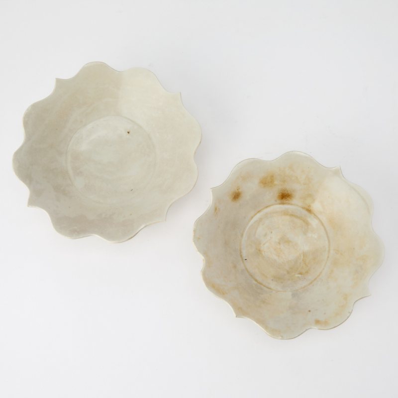 A Rare Pair of Chinese Quatrefoil Dingyao Bowls