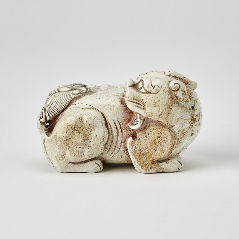 A Chinese Carved Jade Recumbent Qilin