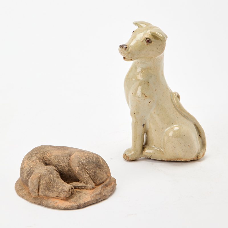 Two Chinese Pottery Figures of Hounds