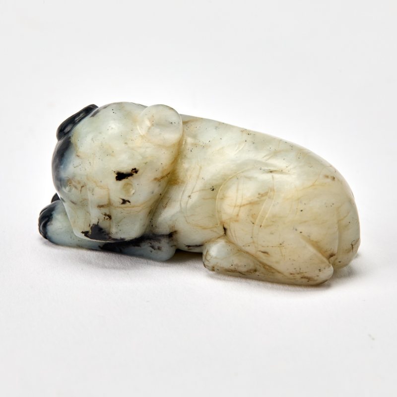 A Chinese Celadon and Black Jade Figure of a Beast