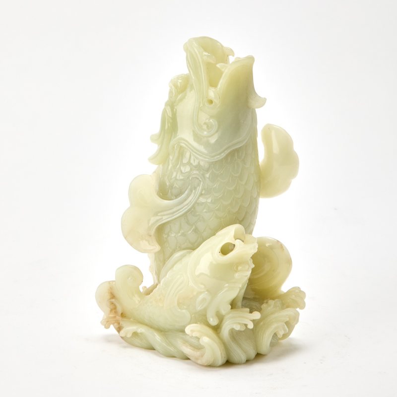 A Chinese Celadon Jade Carving of a Figural Group