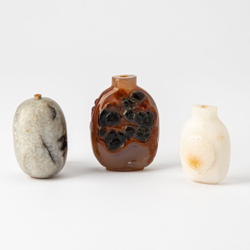 Three Chinese Carved Hardstone Snuff Bottles