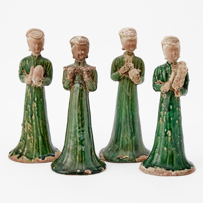 A Group of Four Chinese Green Glazed Pottery Figures of Musicians
